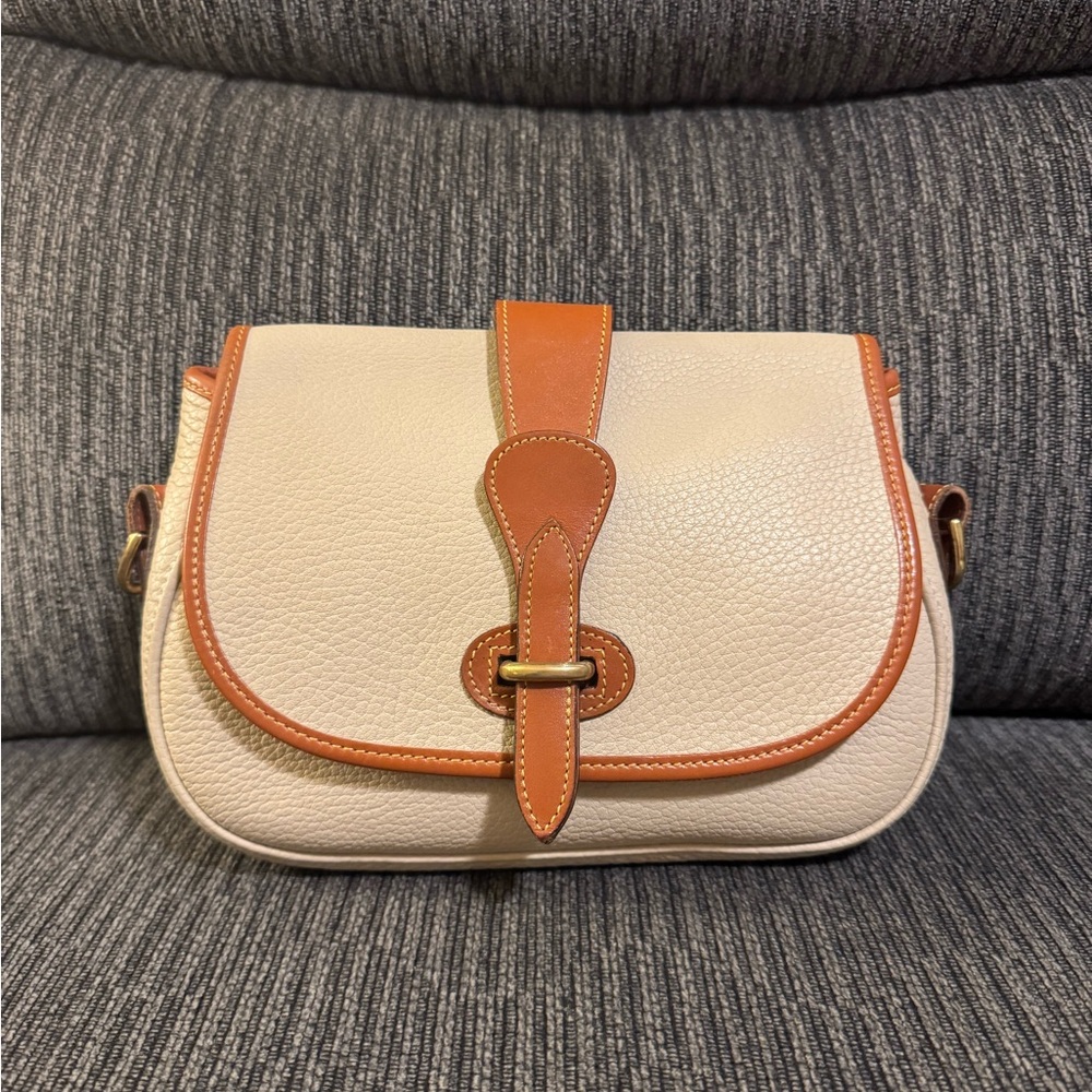 Dooney and Bourne Small tack bag Cream and Tan Leather Bag. No strap.
